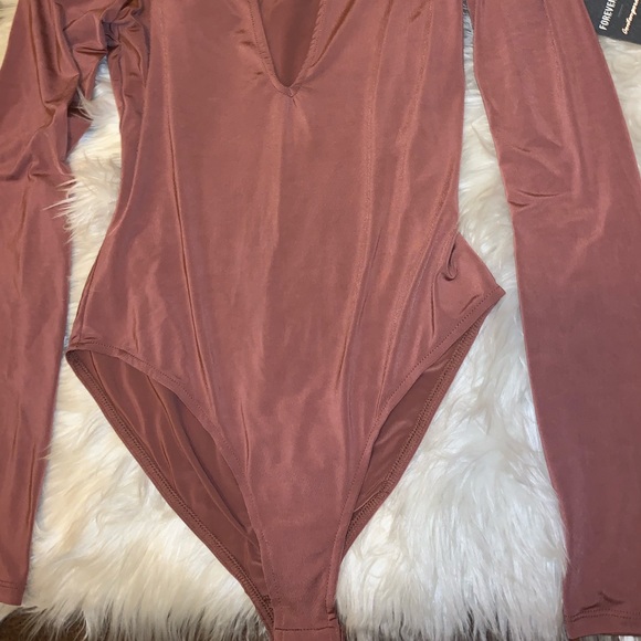 Forever 21 Tops - Forever 21 long sleeve bodysuit in mauve. Size M.